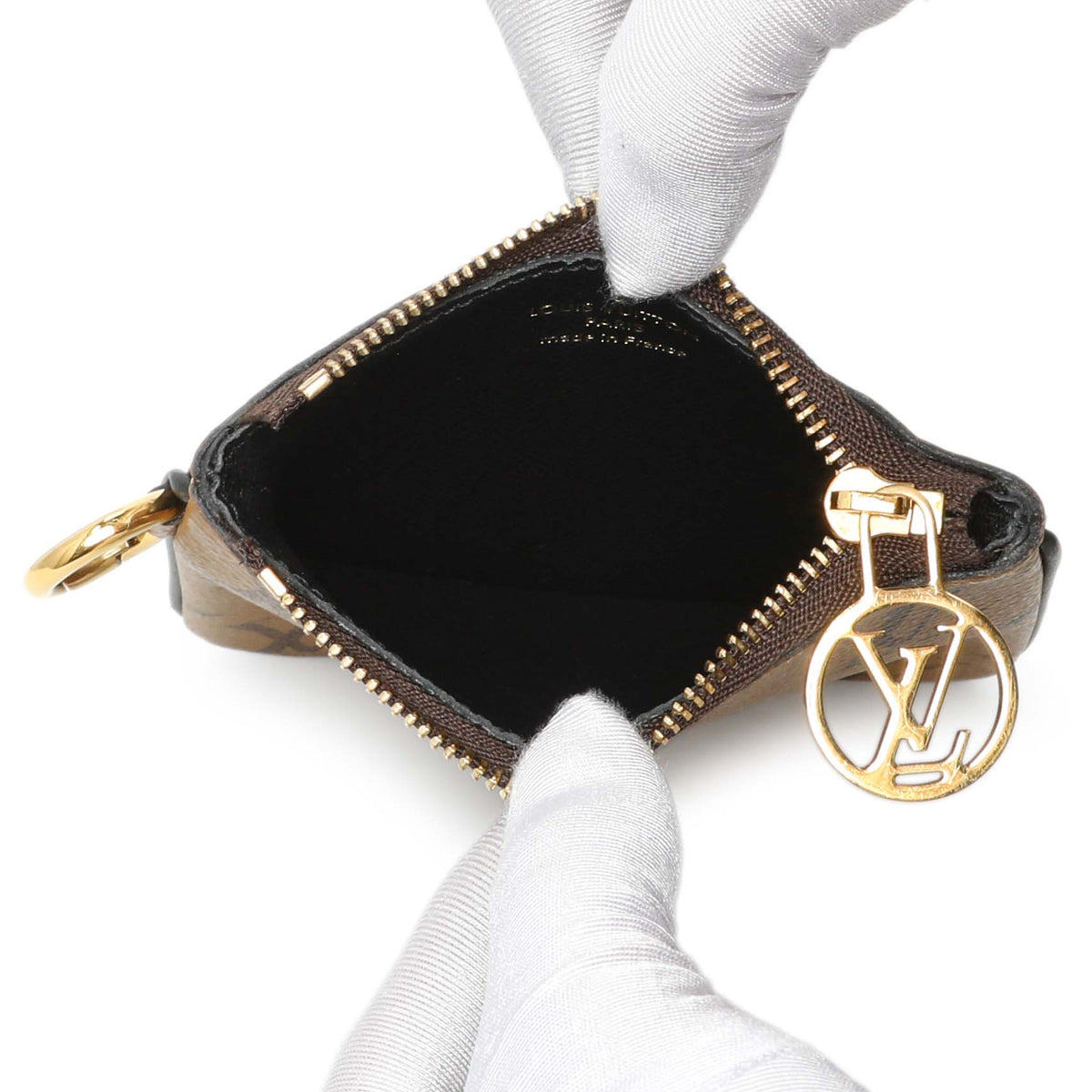 Louis Vuitton Reverse Monogram Giant Trio Pouch Handbags Louis Vuitton