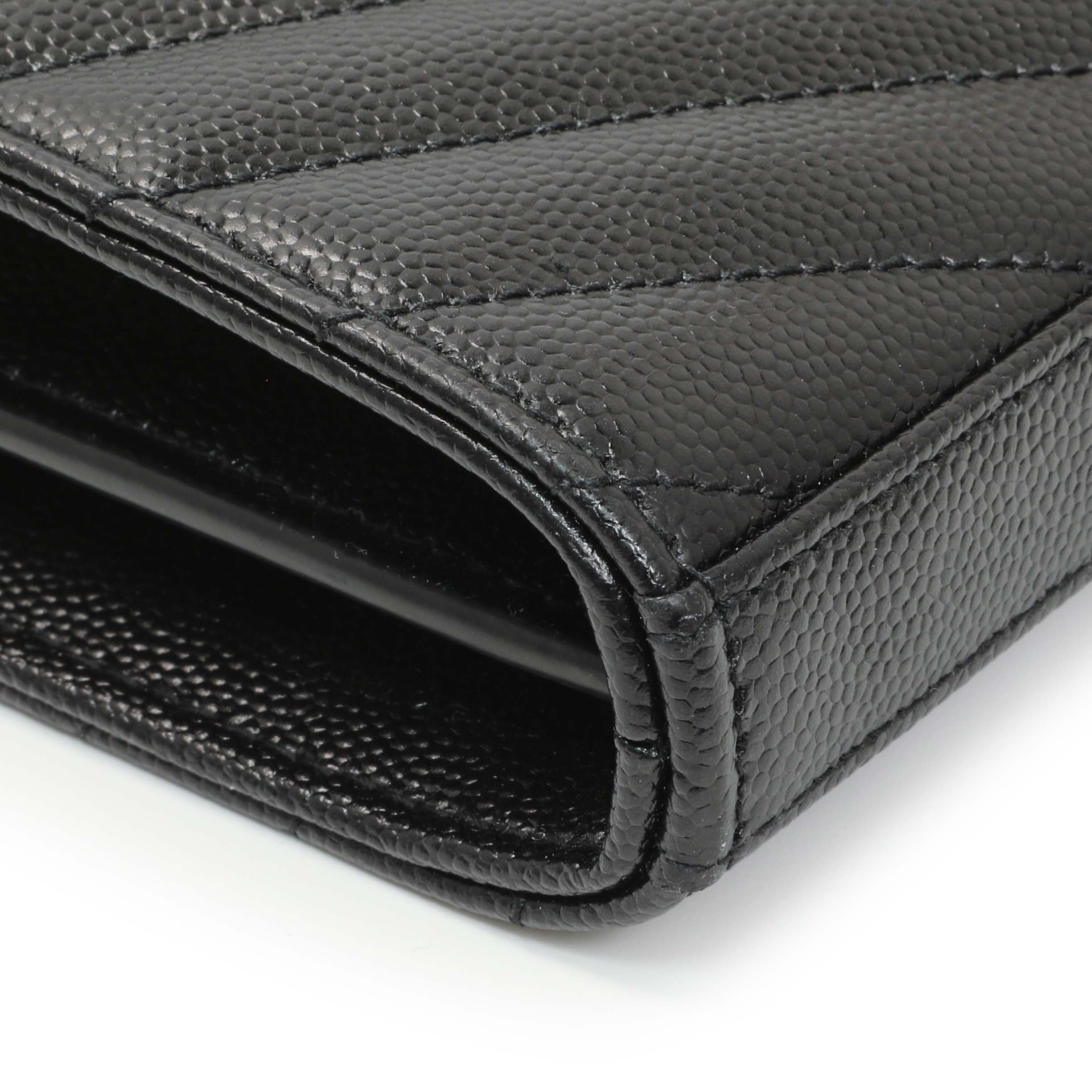 monogram saint laurent chain wallet in black grain de poudre textured matelassé leather
