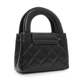 Chanel Black Shiny Aged Calfskin Quilted Mini Nano Kelly Shopper Handbags Chanel
