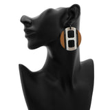 Hermes Lacquered Horn H Equipe Earrings Designer Jewellery Hermes