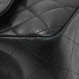 Chanel Black Quilted Caviar Jumbo Double Flap