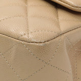 Chanel Beige Quilted Caviar Medium Double Flap Handbags Chanel