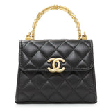 Chanel Black Lambskin Enamel Quilted Mini Top Handle Flap Handbags Chanel
