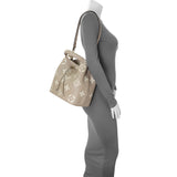 Louis Vuitton Tourterelle Creme Empreinte Monogram Giant Neonoe MM Handbags Louis Vuitton