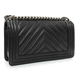 Chanel Black Chevron Quilted Caviar Medium Boy Flap Handbags Chanel