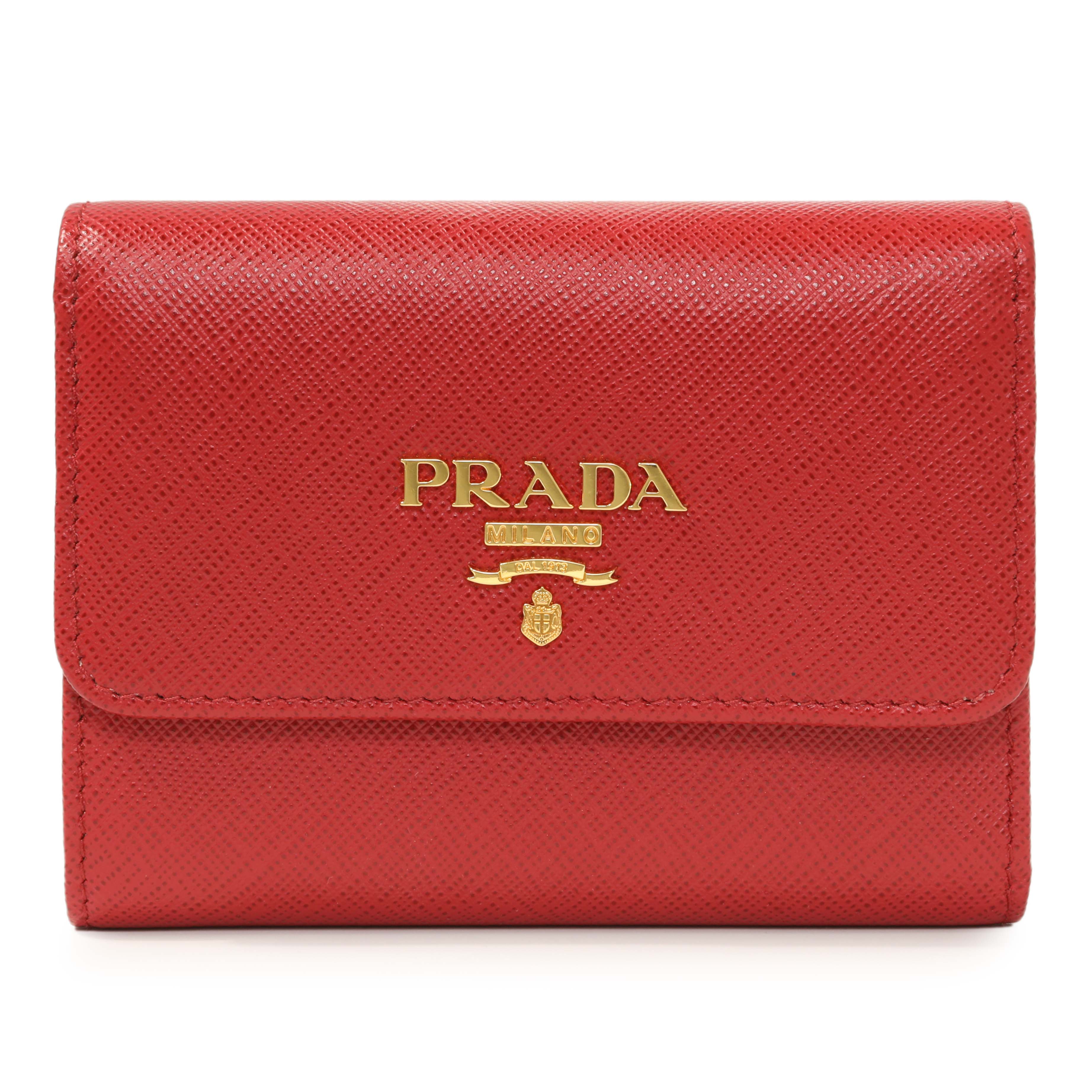 saffiano compact wallet 
BLACK / BERRY Prada Saffiano Tri-Fold Compact Wallet – Modaselle