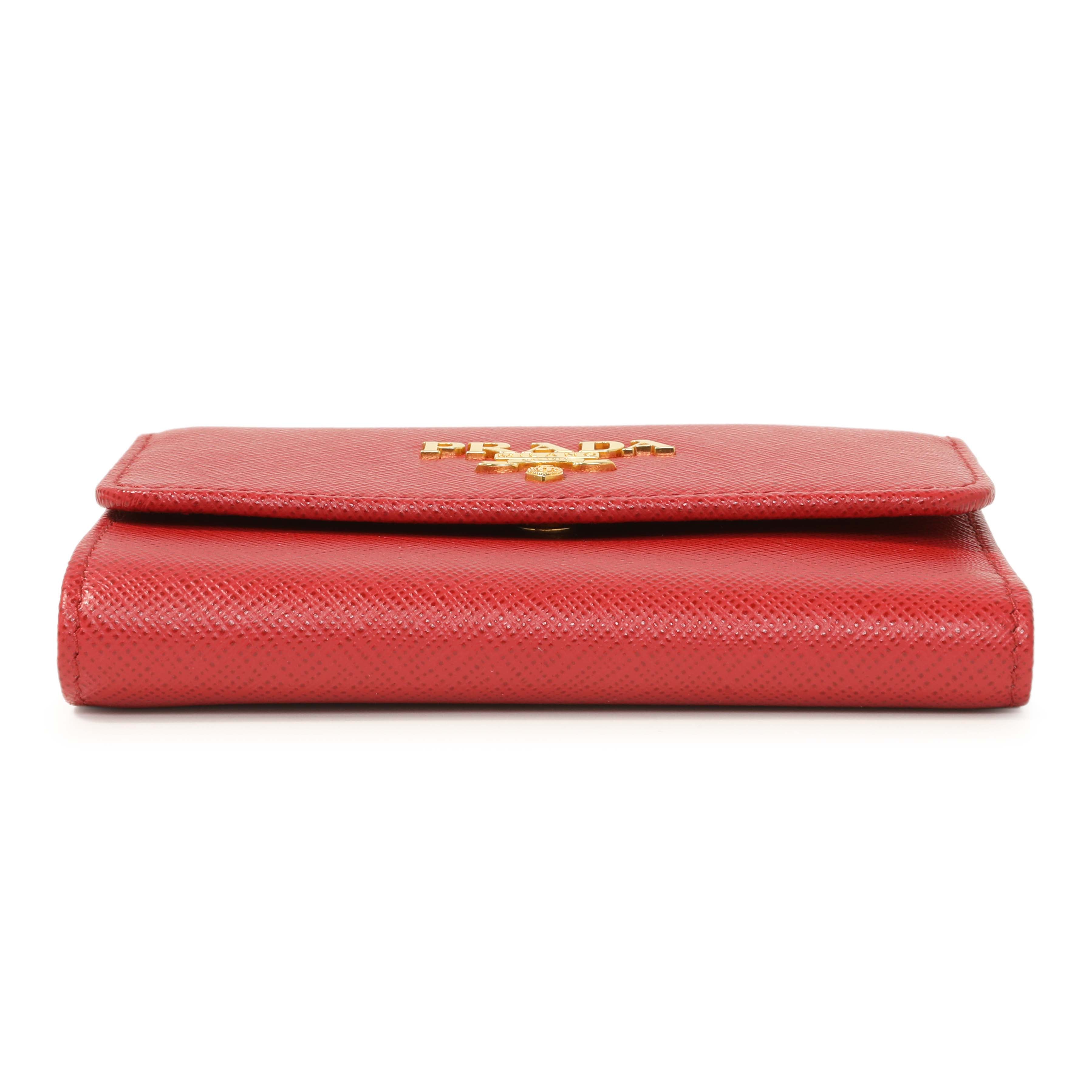 saffiano compact wallet 
BLACK / BERRY Prada Saffiano Tri-Fold Compact Wallet – Modaselle