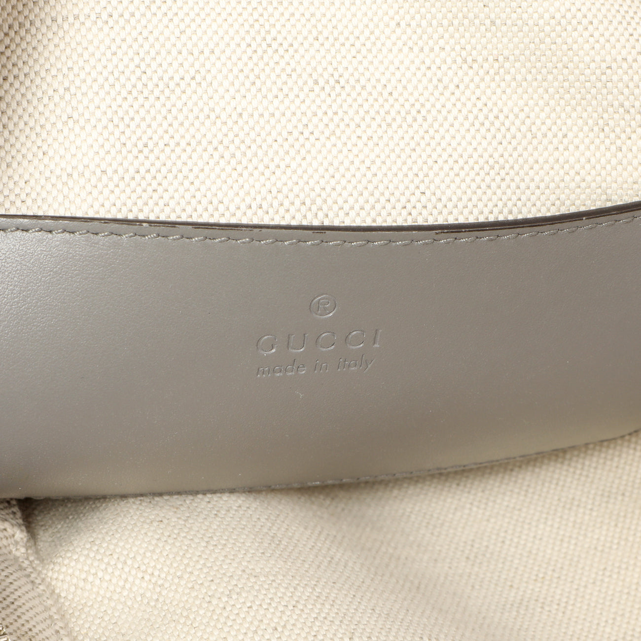 Gucci Grey Calfskin GG Tennis Embossed Sling Backpack Gucci Grey Calfskin GG Tennis Embossed Sling Backpack